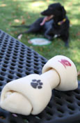 Rawhide Dog Bone With Flying "C" And Paw Print