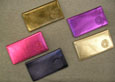 Assorted Metalic Checkbook Holders With Cmu Seal