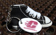 Black Tennis Shoe Key Chain W/ Flying "C" Tag