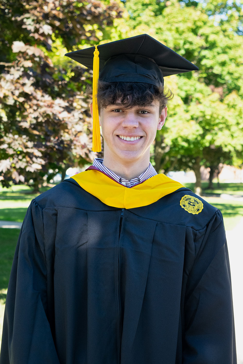 Premium Photo | Graduating student holding blank frame