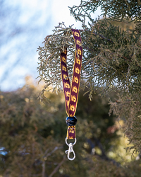 Action C Maroon and Gold Satin Wrist Lanyard