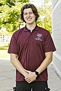 CMU College of Medicine Maroon Omega Tech Polo<br><small>VANSPORT</small>